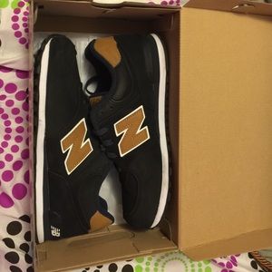 All black with brown "N" & New balance logo